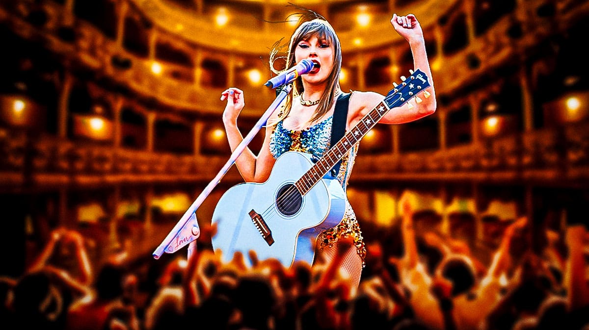 Taylor Swift on stage with her guitar