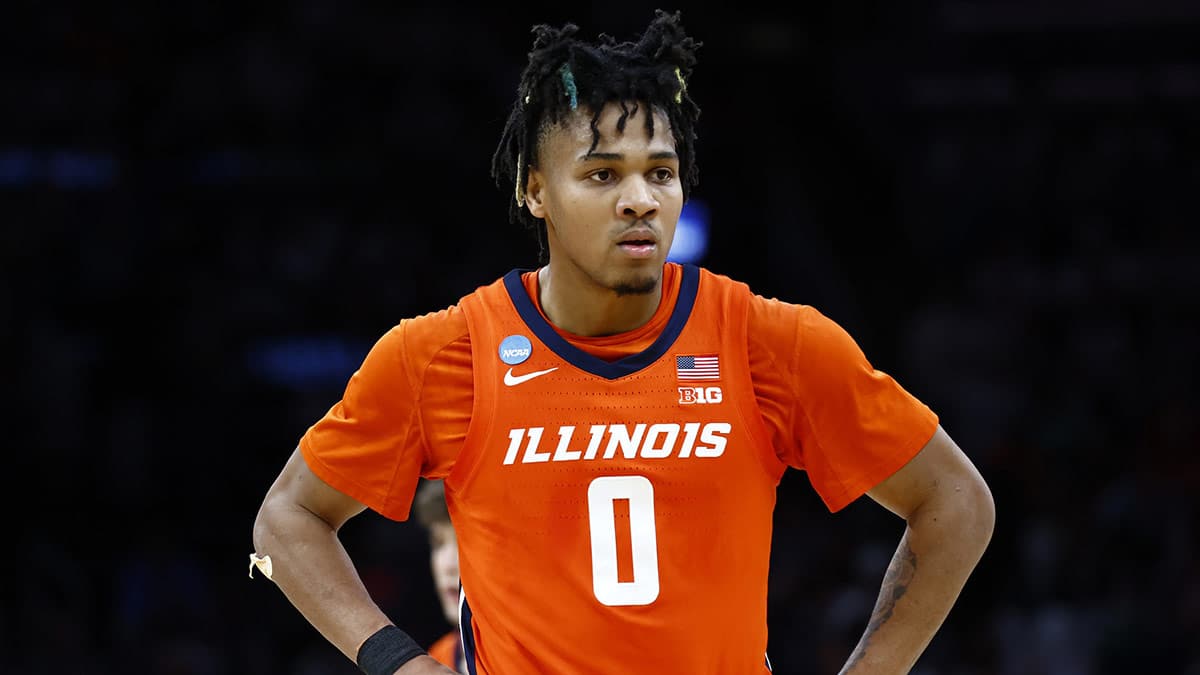 Illinois Fighting Illini guard Terrence Shannon Jr. (0) reacts against the Connecticut Huskies in the finals of the East Regional of the 2024 NCAA Tournament at TD Garden.