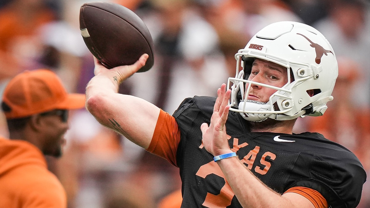 Texas Longhorns quarterback Quinn Ewers (3) throws a pass while warming up ahead of the Longhorns' spring Orange and White game at Darrell K Royal Texas Memorial Stadium.