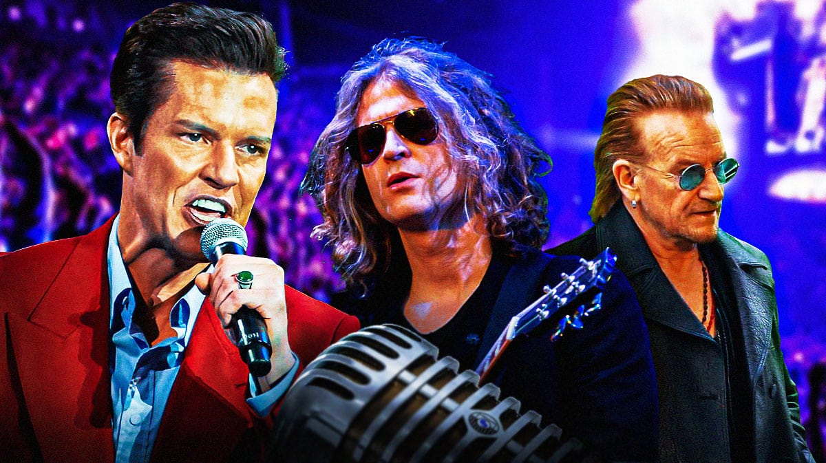 Brandon Flowers and Dave Keuning of the Killers with U2 singer Bono and 3Arena in Dublin, Ireland, background.