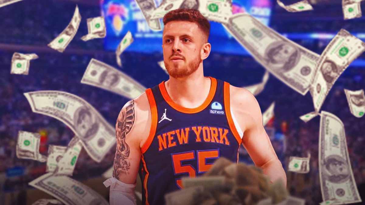Isaiah Hartenstein with money falling around him