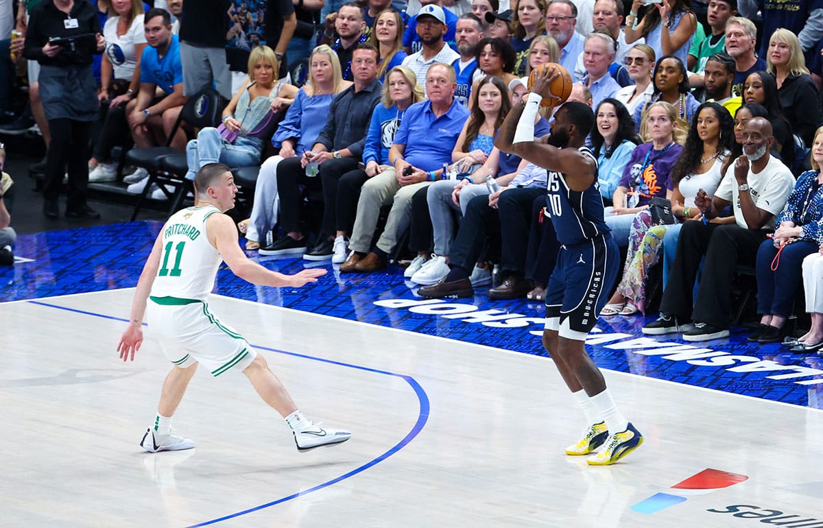 Dallas Mavericks forward Tim Hardaway Jr. (10) shoots over Boston Celtics guard Payton Pritchard (11) during the second half during game four of the 2024 NBA Finals at American Airlines Center. 