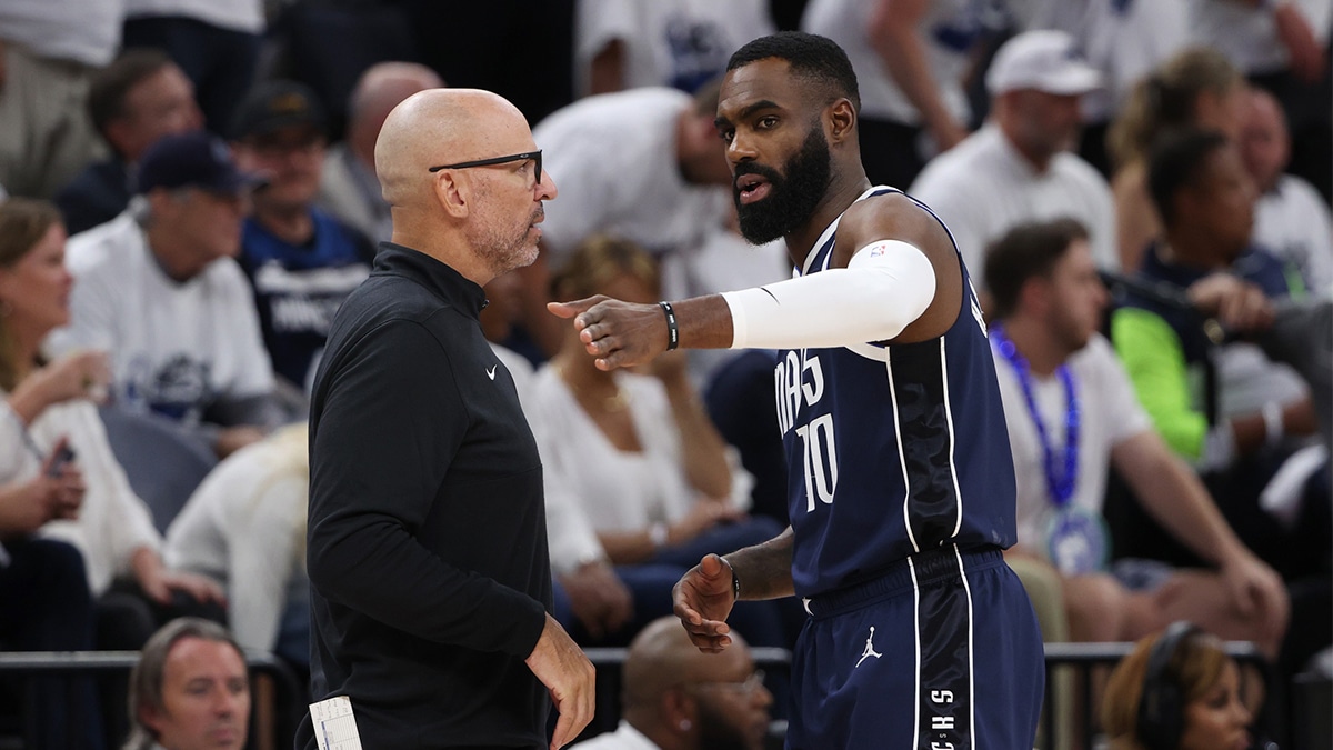 Dallas Mavericks forward Tim Hardaway Jr. (10) talks with head coach Jason Kidd in the fourth quarter against the Minnesota Timberwolves during game one of the western conference finals for the 2024 NBA playoffs at Target Center. 