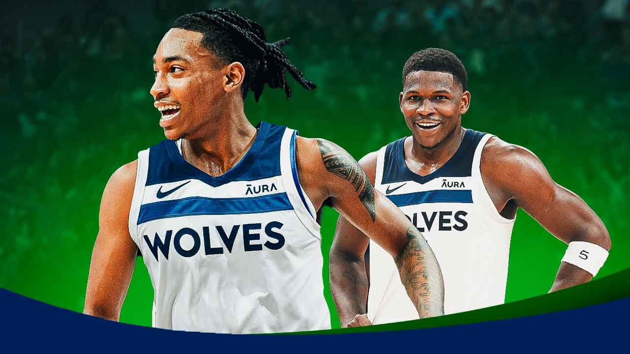 Rob Dillingham in a Timberwolves uni, with Anthony Edwards smiling beside him