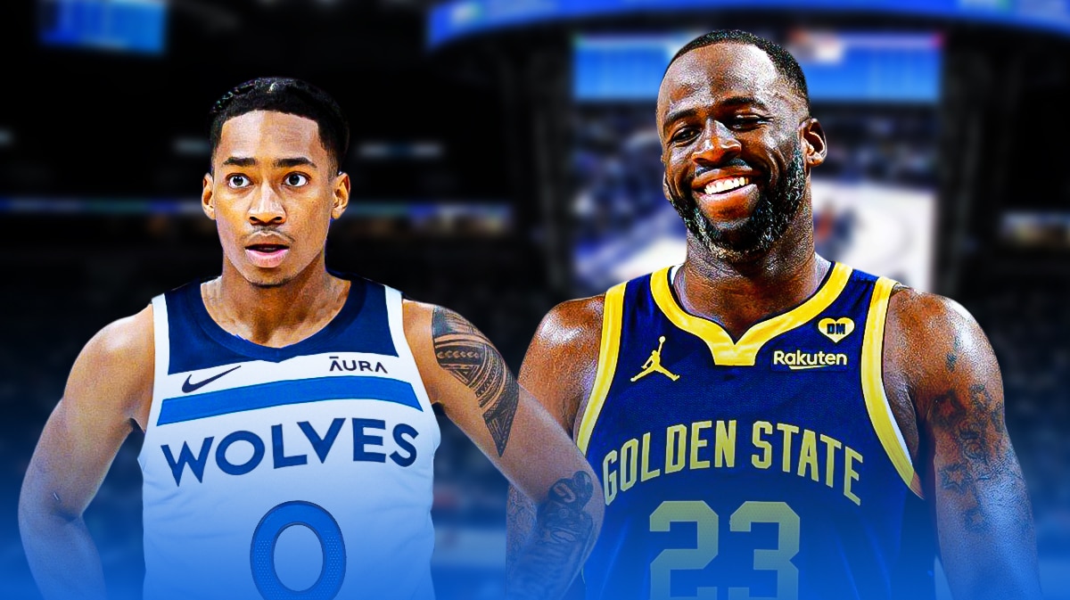 Draymond Green smiling at Rob Dillingham wearing Timberwolves jersey.