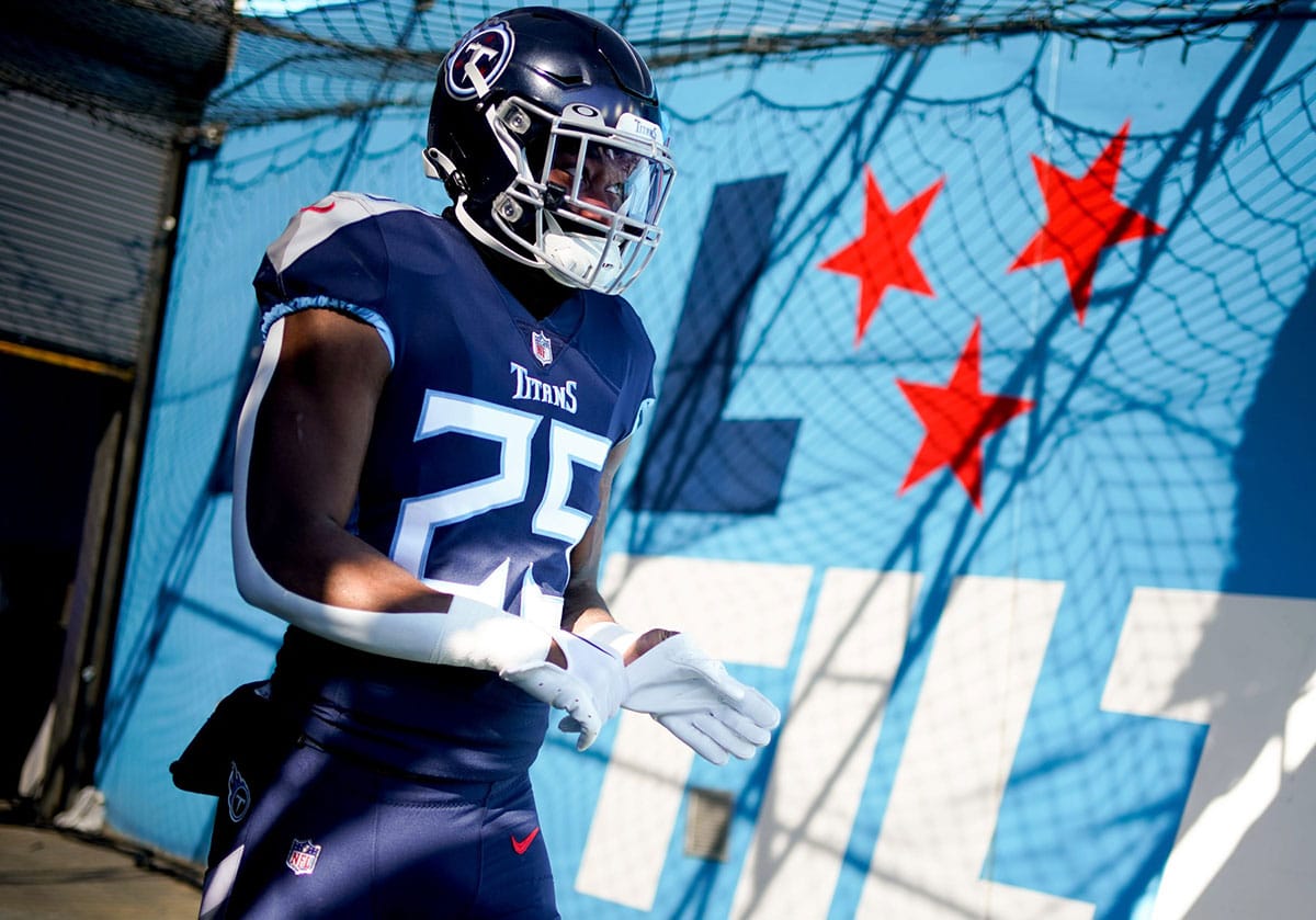 Tennessee Titans running back Hassan Haskins (25) heads to the field before facing the Houston Texans at Nissan Stadium in Nashville, Tenn., Saturday, Dec. 24, 2022
