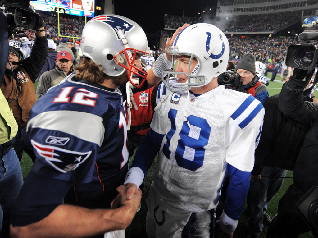 ndianapolis Colts quarterback Peyton Manning, right, meets with New England Patriots quarterback Tom Brady after a game at Gillette Stadium on Nov. 21, 2010. The Colts lost 31-28.