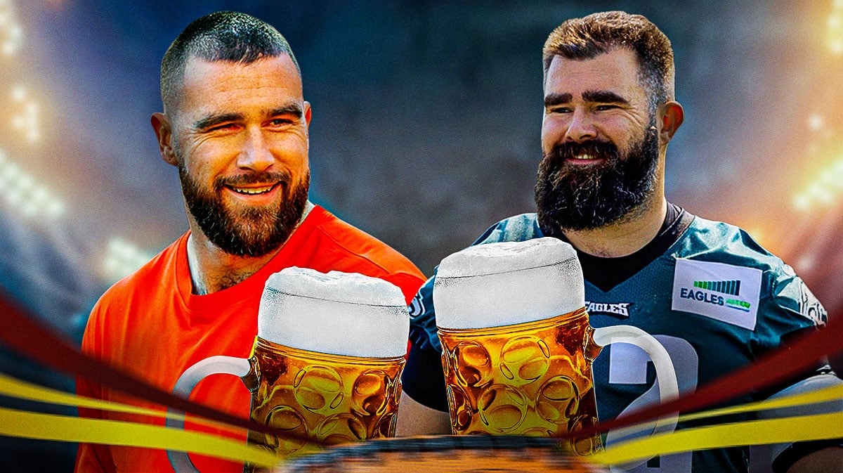 Former Eagles center Jason Kelce with his brother, Kansas City Chiefs tight end Travis Kelce. They are both laughing and holding a beer in their hand.