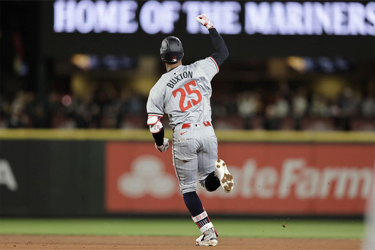 Minnesota Twins outfielder Byron Buxton (25) celebrates his three-run home run hit against the Seattle Mariners during the sixth inning at T-Mobile Park.