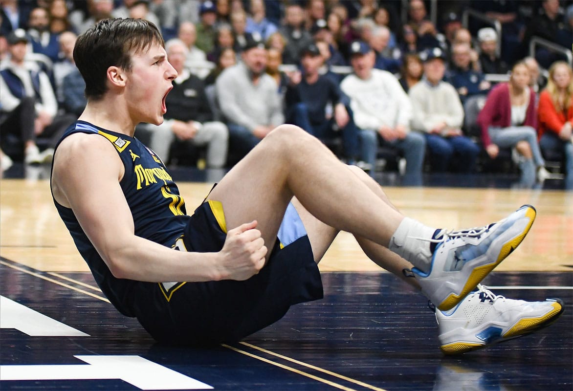 Marquette Golden Eagles guard Tyler Kolek (11) celebrates after making a shot and being fouled against the Butler Bulldogs during the second half at Hinkle Fieldhouse.