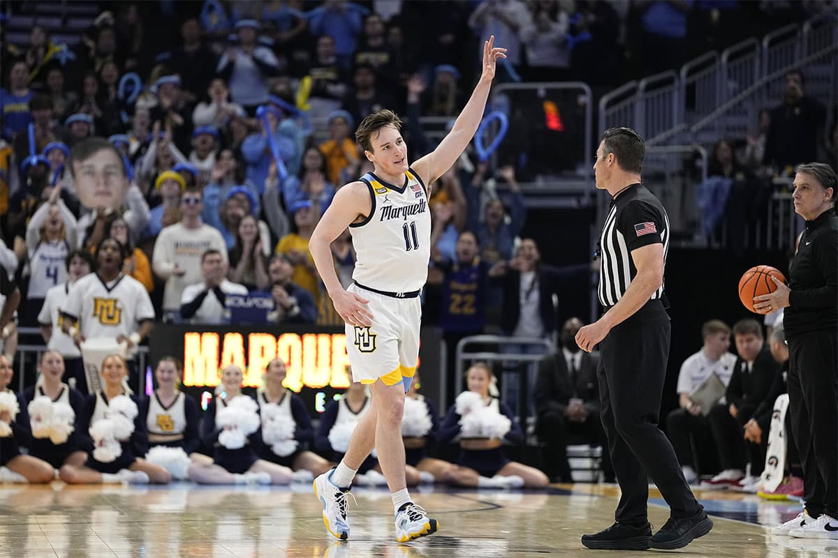 Marquette Golden Eagles guard Tyler Kolek (11) acknowledges the crowd during the second half against the DePaul Blue Demons at Fiserv Forum.