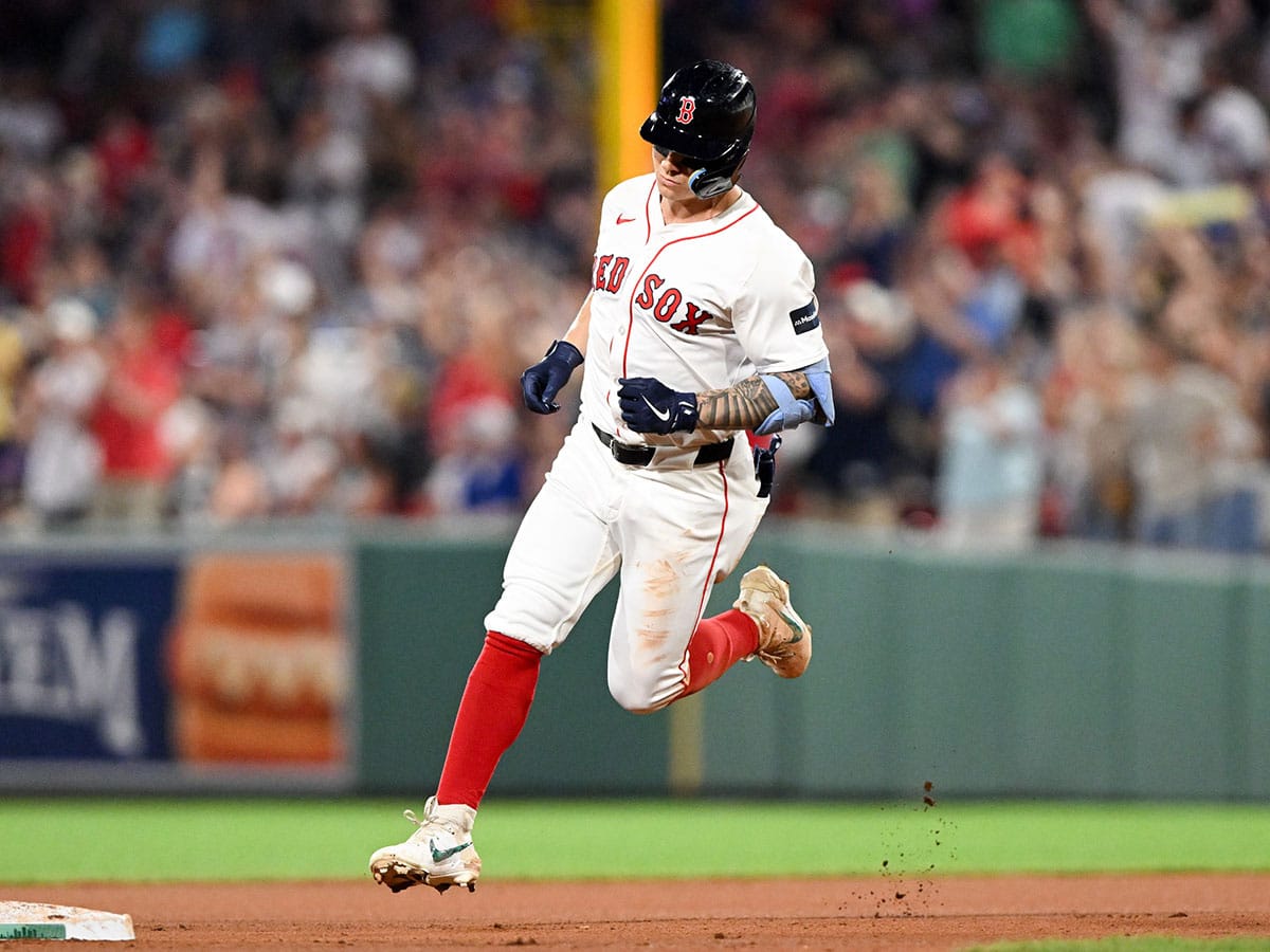 Boston Red Sox left fielder Tyler O'Neill (17) runs the bases after hitting a two-run home run against the Toronto Blue Jays during the sixth inning at Fenway Park. 