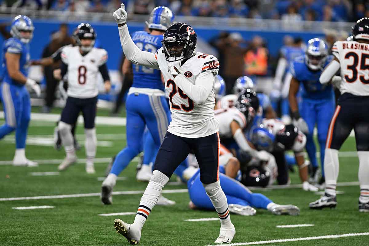 Chicago Bears cornerback Tyrique Stevenson (29) celebrates after a fumble recovery against the Detroit Lions in the third quarter at Ford Field.