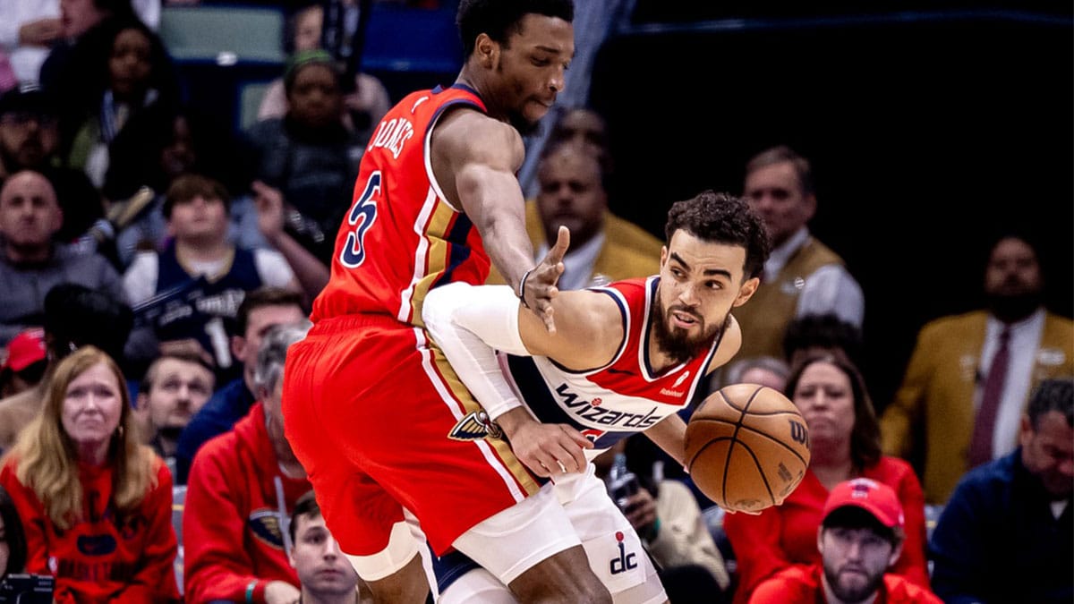 Washington Wizards guard Tyus Jones (5) passes the ball against New Orleans Pelicans forward Herbert Jones (5) during the first half at Smoothie King Center. 