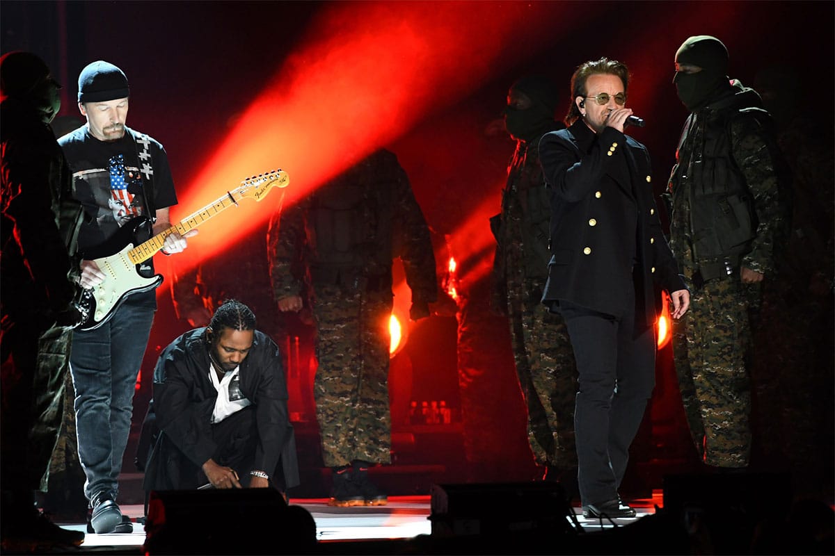 U2 members The Edge and Bono performing at the Grammys in 2018.