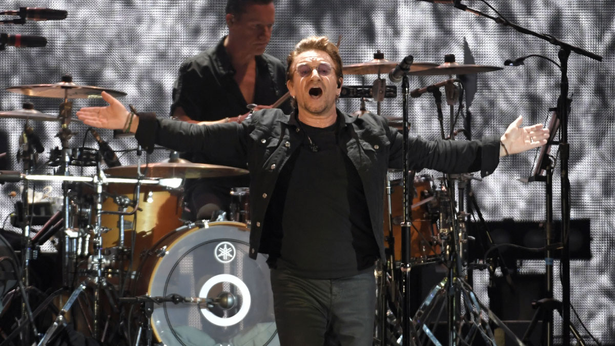 U2, Bono performing at 2017 Bonnaroo Festival.