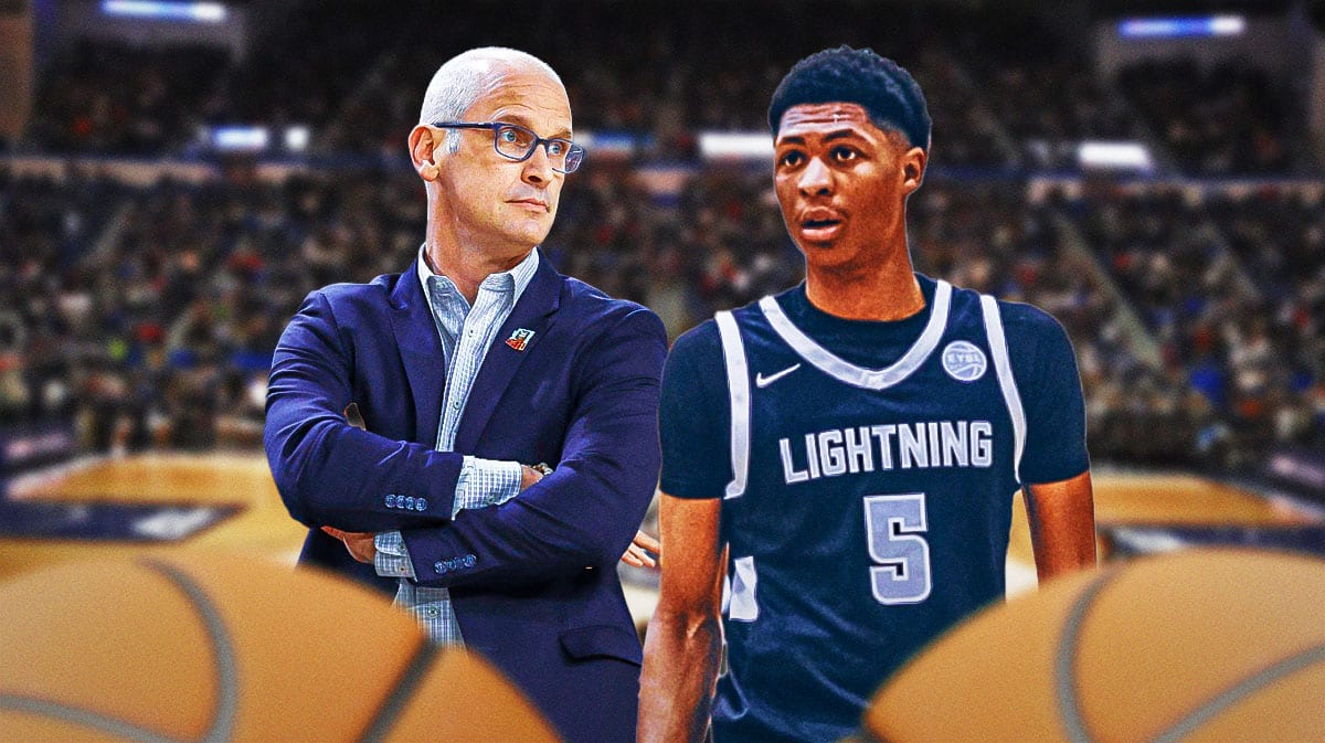 UConn basketball head coach Dan Hurley and basketball prospect Meleek Thomas in front of Harry A. Gampel Pavilion.