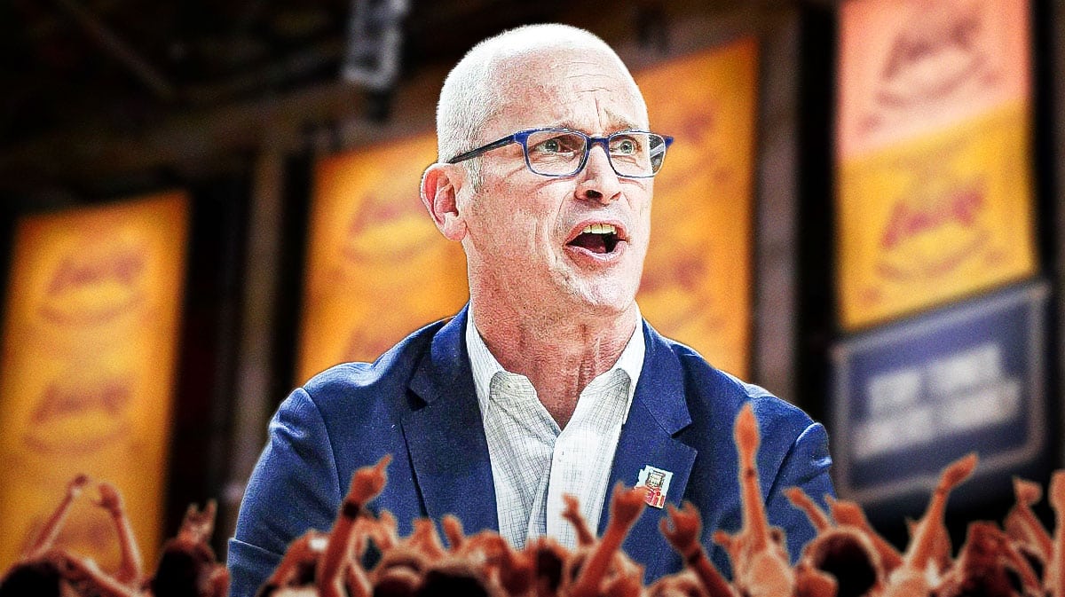UConn basketball coach Dan Hurley in front of Los Angeles Lakers championship banners