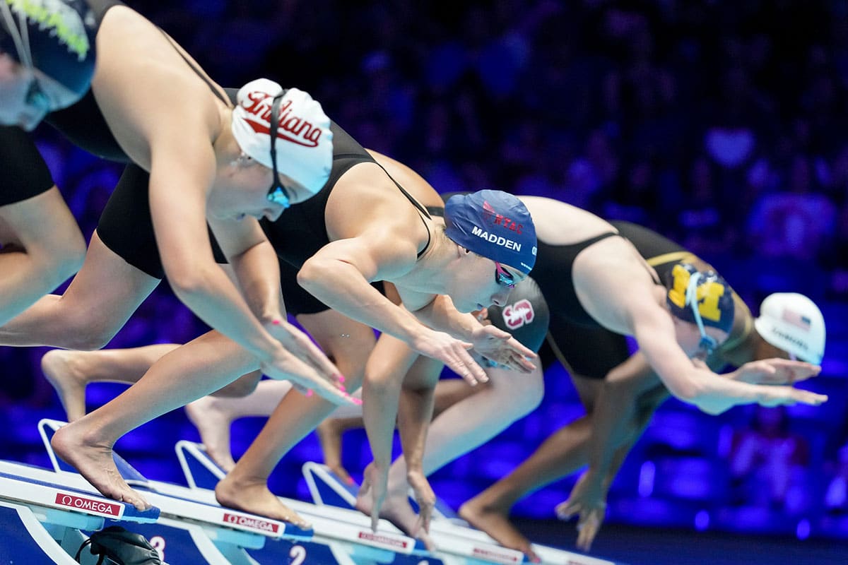 Swimmers including Paige Madden prepare to compete in the 200-meter freestyle semifinals Sunday, June 16, 2024, during the first day of competition for the U.S. Olympic Team Swimming Trials at Lucas Oil Stadium in Indianapolis.