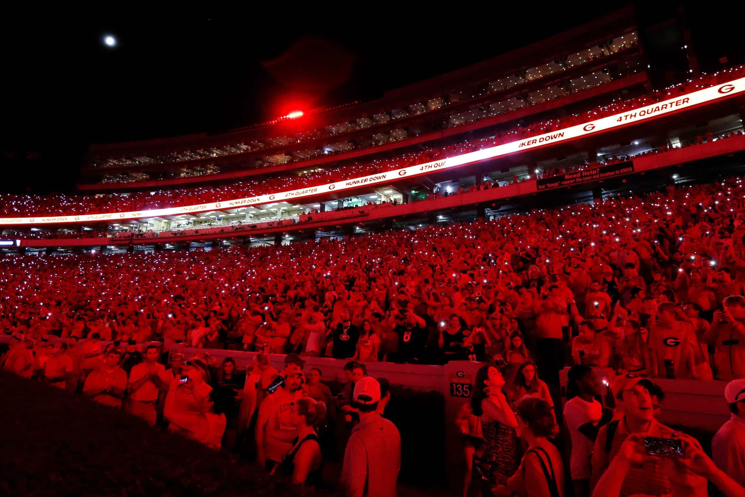 Sanford Stadium is lit up red at the start of the fourth quarter during an NCAA college football game between South Carolina and Georgia in Athens, Ga., on Sept. 18, 2021. Georgia won 40-13.