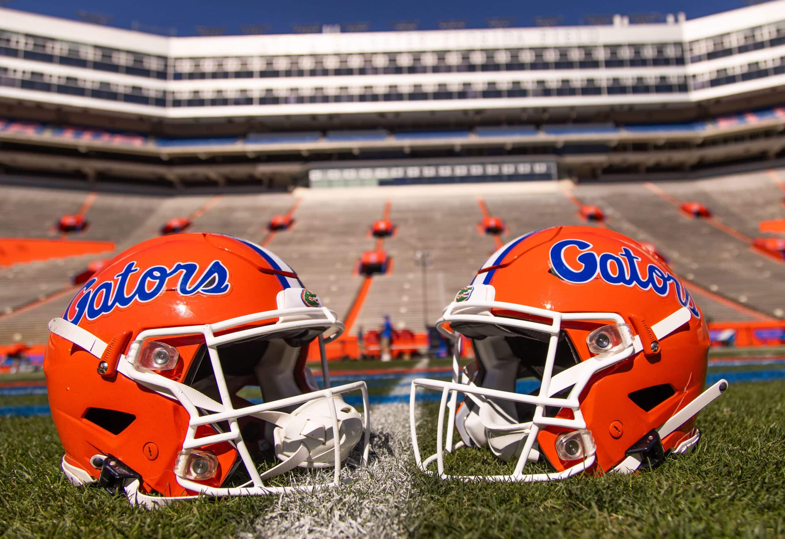 Two helmets rest on Steve Spurrier-Florida Field before the start of the Orange and Blue game at Ben Hill Griffin Stadium in Gainesville, FL on Saturday, April 13, 2024.
