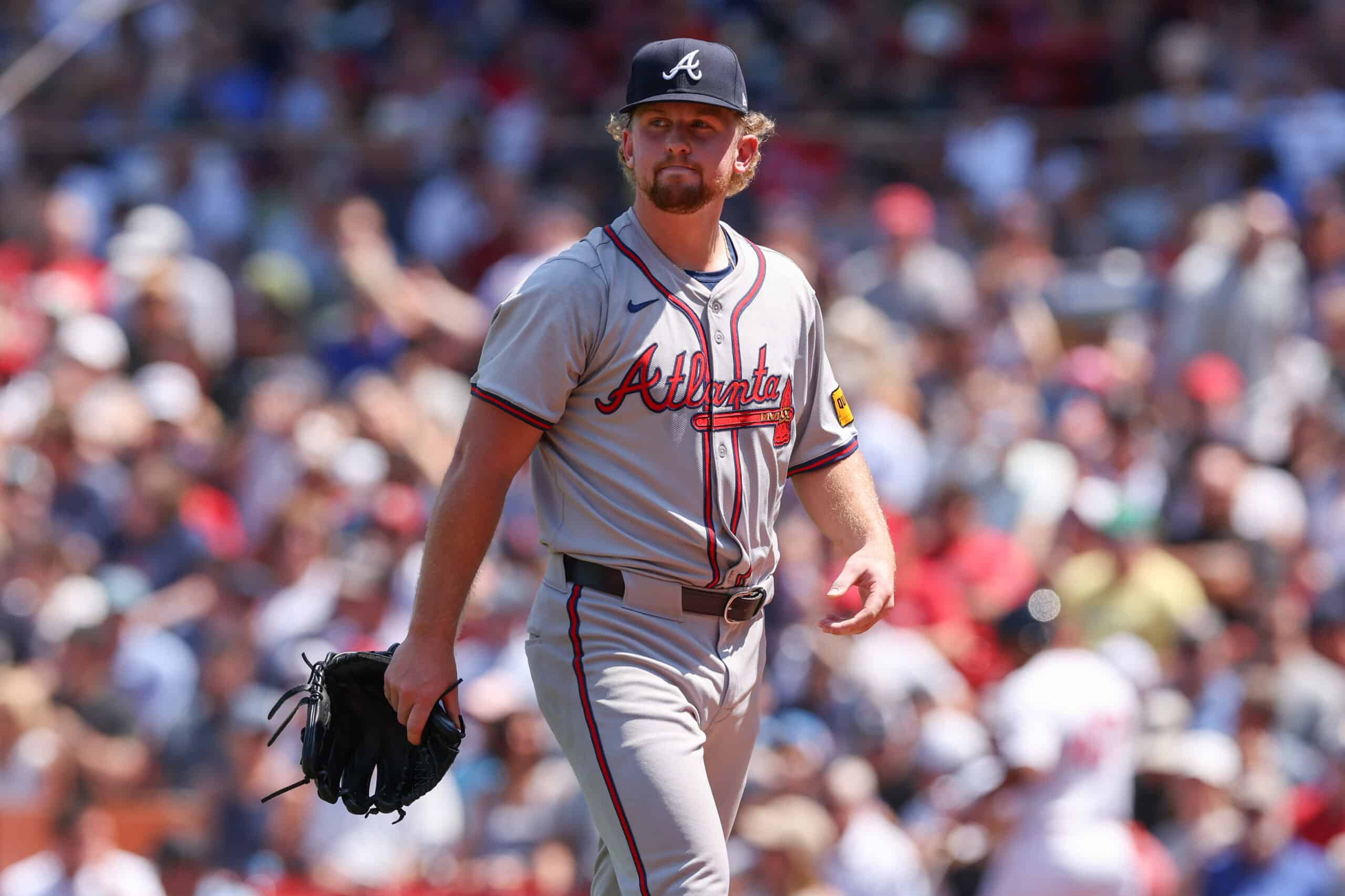 Jun 5, 2024; Boston, Massachusetts, USA; Atlanta Braves starting pitcher Spencer Schwellenbach (56) reacts during the second inning against the Boston Red Sox at Fenway Park. 