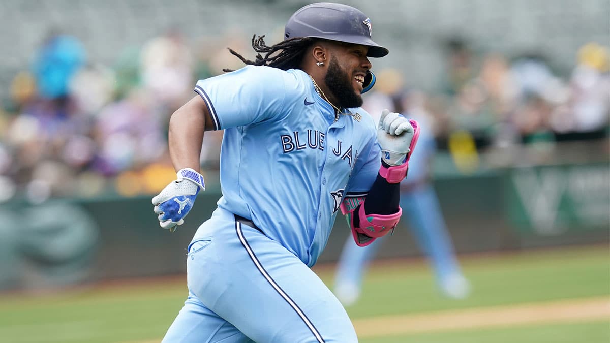 Toronto Blue Jays first baseman Vladimir Guerrero Jr. (27) runs towards first base after hitting a double against the Oakland Athletics in the fifth inning at Oakland-Alameda County Coliseum. 