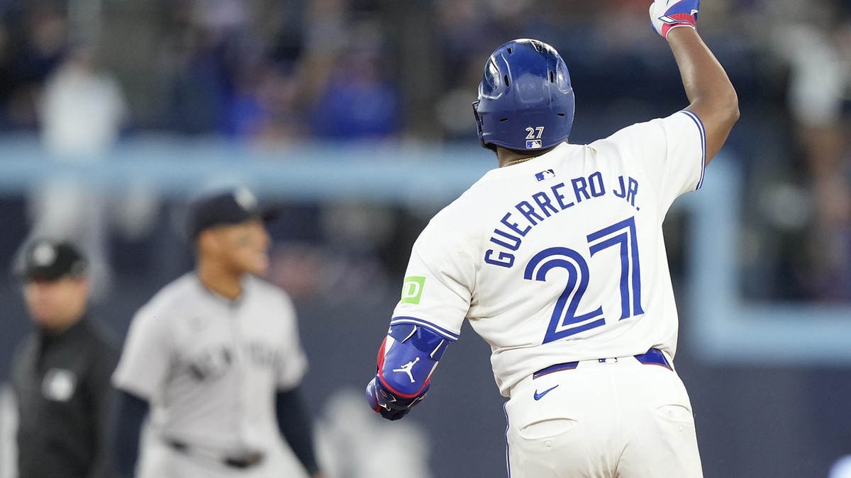 Toronto Blue Jays first baseman Vladimir Guerrero Jr. (27) celebrates his solo home run against the New York Yankees as he runs to second base during the sixth inning at Rogers Centre.