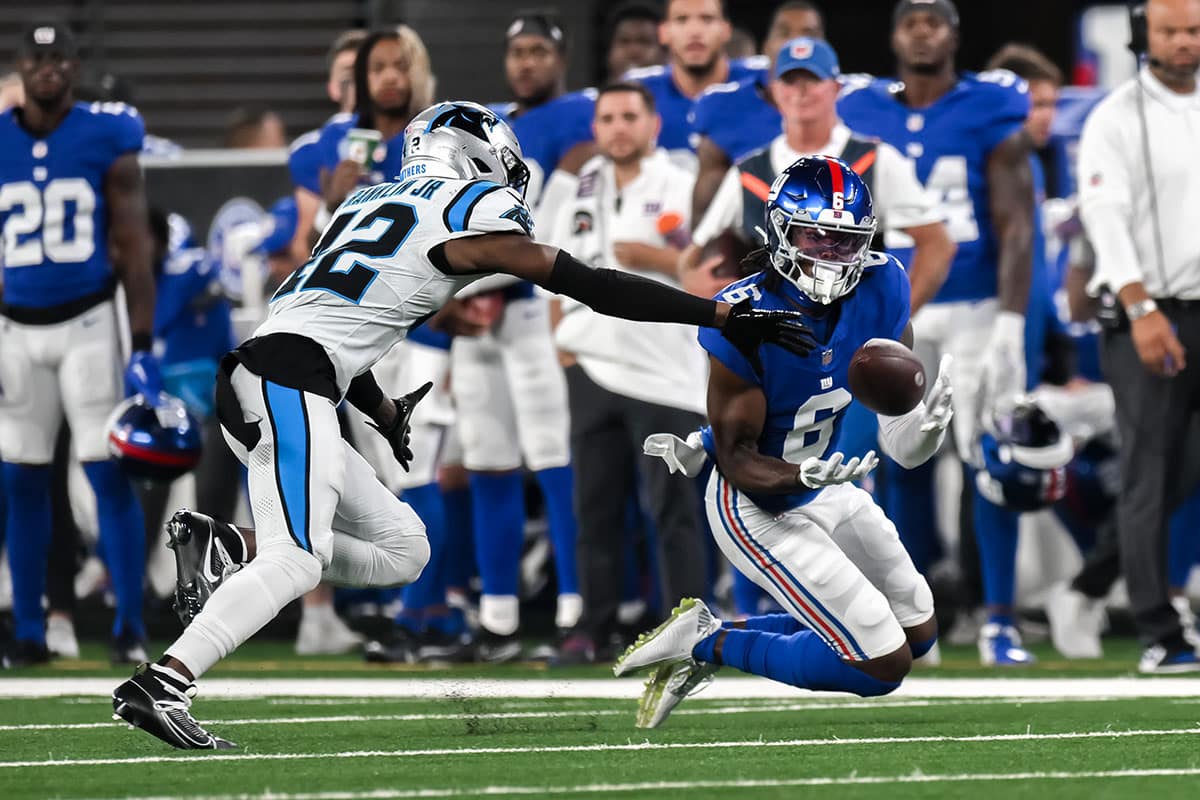 New York Giants wide receiver Bryce Ford-Wheaton (6) makes a catch as Carolina Panthers safety Sam Franklin Jr. (42) defends during the third quarter at MetLife Stadium.