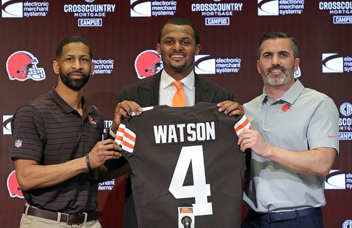 Cleveland Browns quarterback Deshaun Watson, center, poses for a portrait with general manager Andrew Berry, left, and head coach Kevin Stefanski during Watson's introductory press conference at the Cleveland Browns Training Facility on Friday.