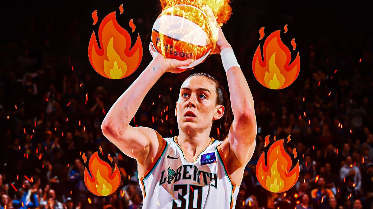Breanna Stewart (Liberty) shooting, would be good to get a basket in frame on the left with her shooting toward it on the right or vice versa. Flames emojis in background