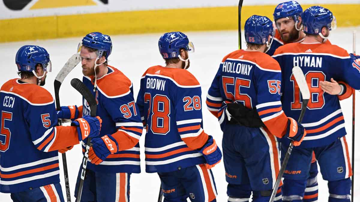 Edmonton Oilers players celebrate their win at the end of the third period in game six of the Western Conference Final of the 2024 Stanley Cup Playoffs at Rogers Place.