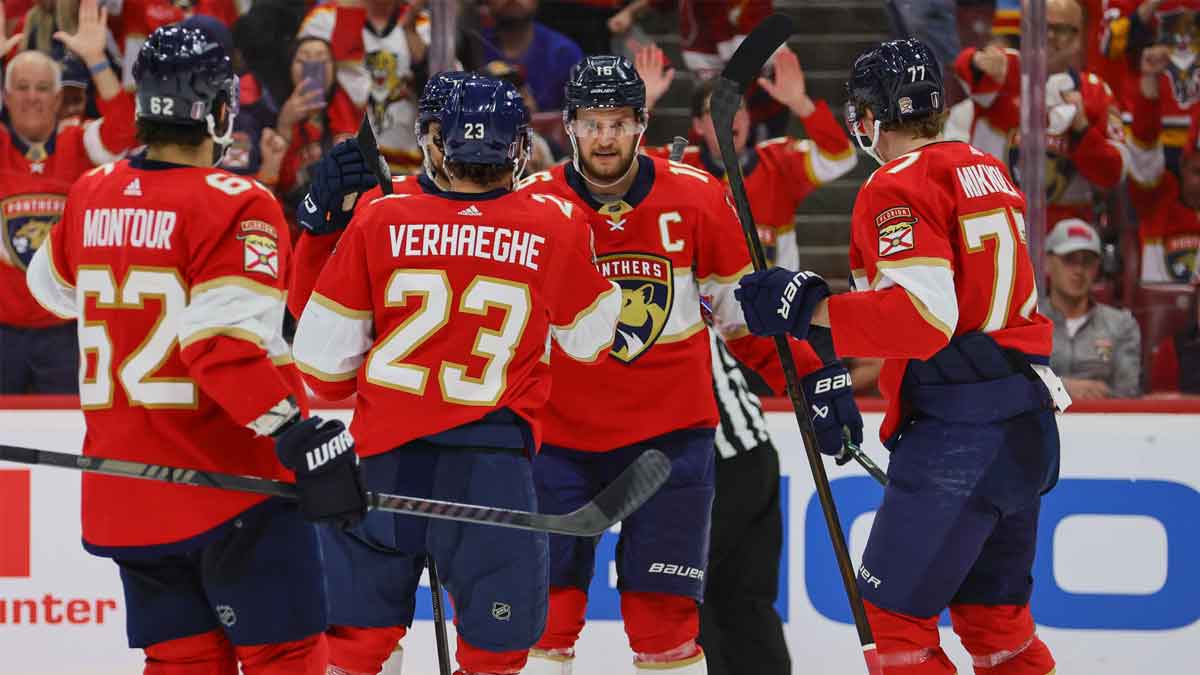 Florida Panthers center Aleksander Barkov (16) celebrates with teammates after scoring against the New York Rangers during the third period in game three of the Eastern Conference Final of the 2024 Stanley Cup Playoffs at Amerant Bank Arena.