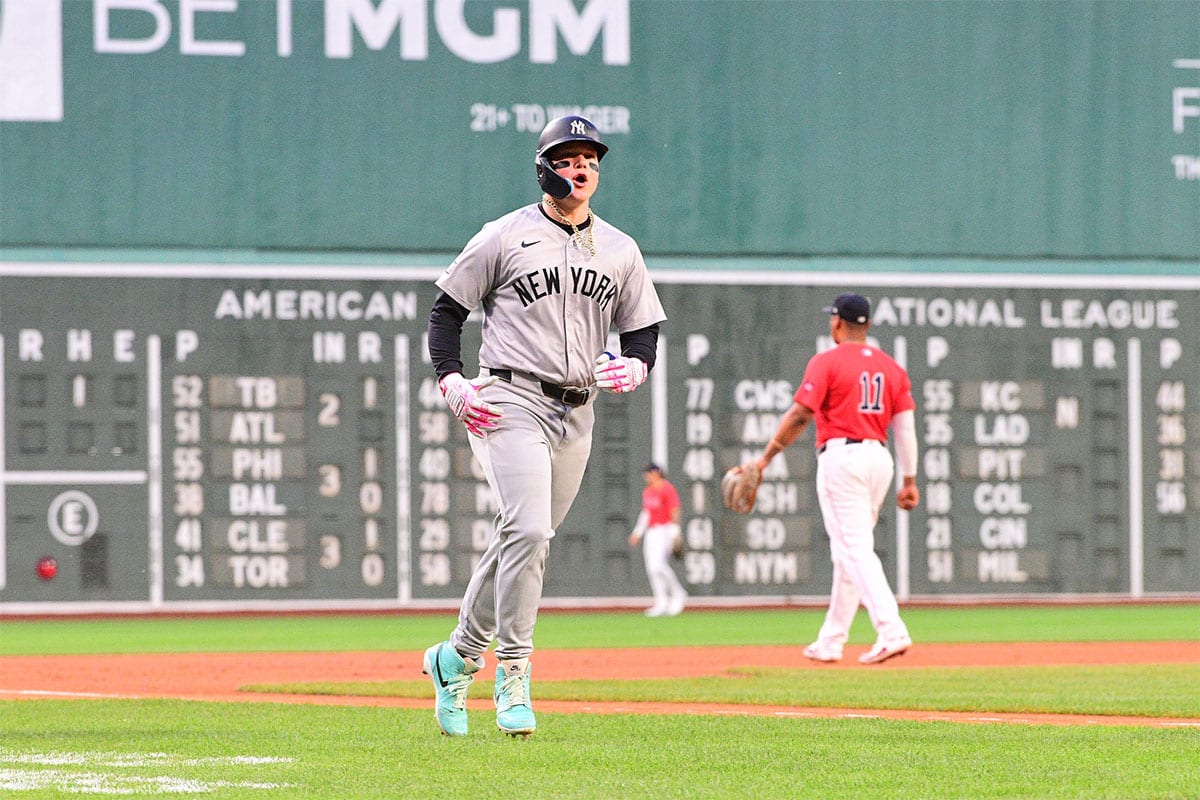 New York Yankees right fielder Alex Verdugo (24) reacts to his hits a two-run home run against the Boston Red Sox during the first inning at Fenway Park. 