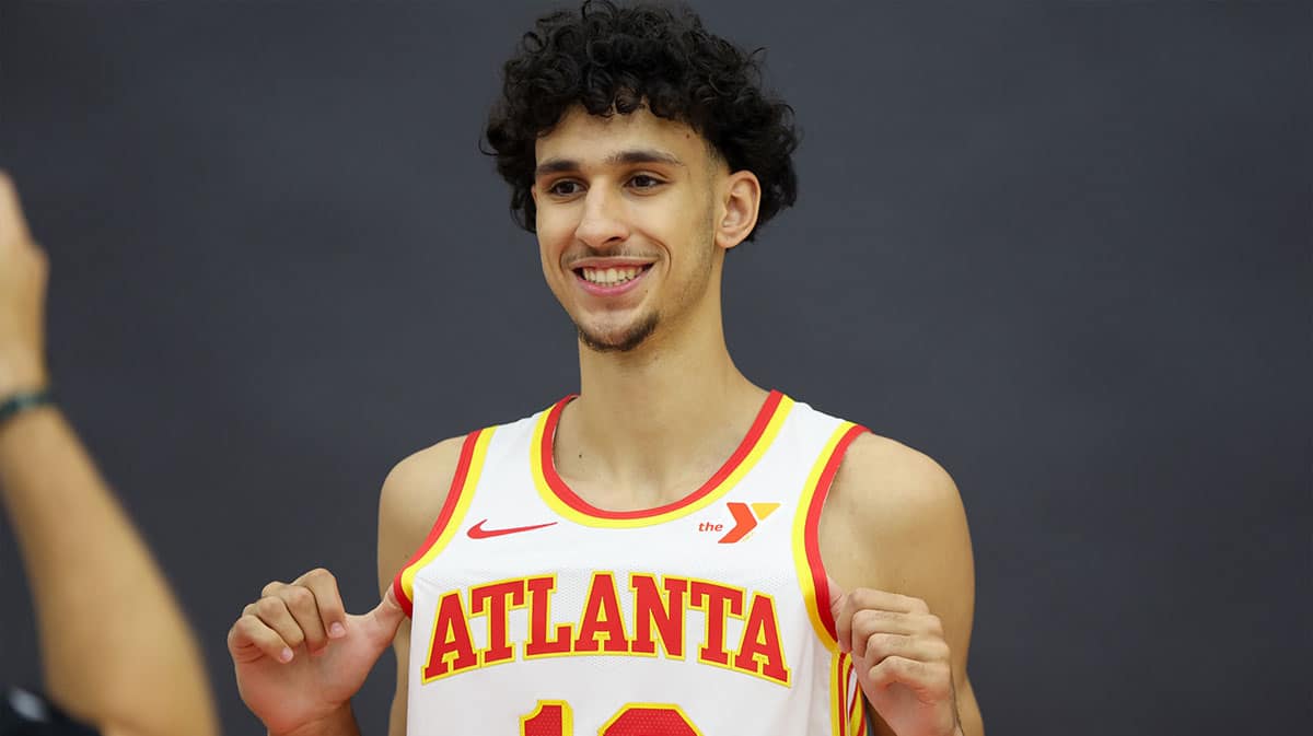 Atlanta Hawks first overall draft pick Zaccharie Risacher (10) poses for a photo at the Emory Sports Medicine Complex.
