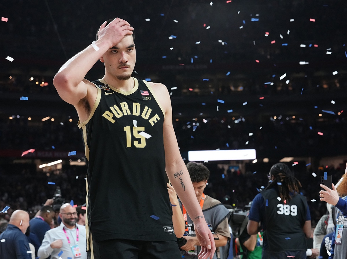 A dejected Purdue Boilermakers center Zach Edey (15) walks off the court after losing the Men's NCAA national championship game to Connecticut Huskies at State Farm Stadium in Glendale on April 8, 2024.