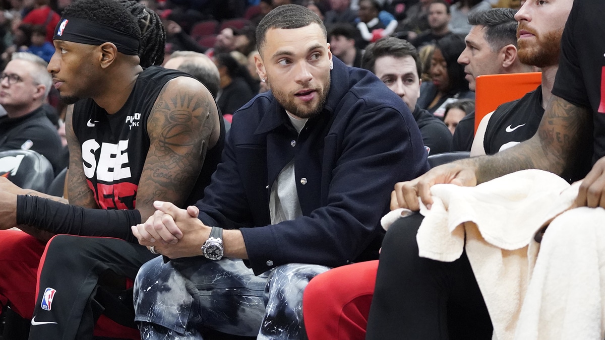 Chicago Bulls guard Zach LaVine (8) sits on the bench in street clothes during the first quarter at United Center.