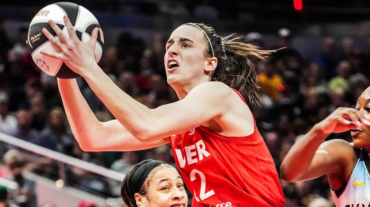 Indiana Fever guard Caitlin Clark (22) drives to the basket against the Chicago Sky during a game at Grainbridge Fieldhouse.