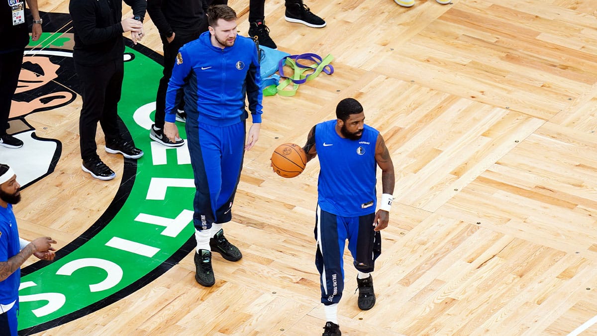 Jun 17, 2024; Boston, Massachusetts, USA; Dallas Mavericks guard Luka Doncic (77) and guard Kyrie Irving (11) warm up before game five against the Boston Celtics in the 2024 NBA Finals at TD Garden. Mandatory Credit: David Butler II-USA TODAY Sports