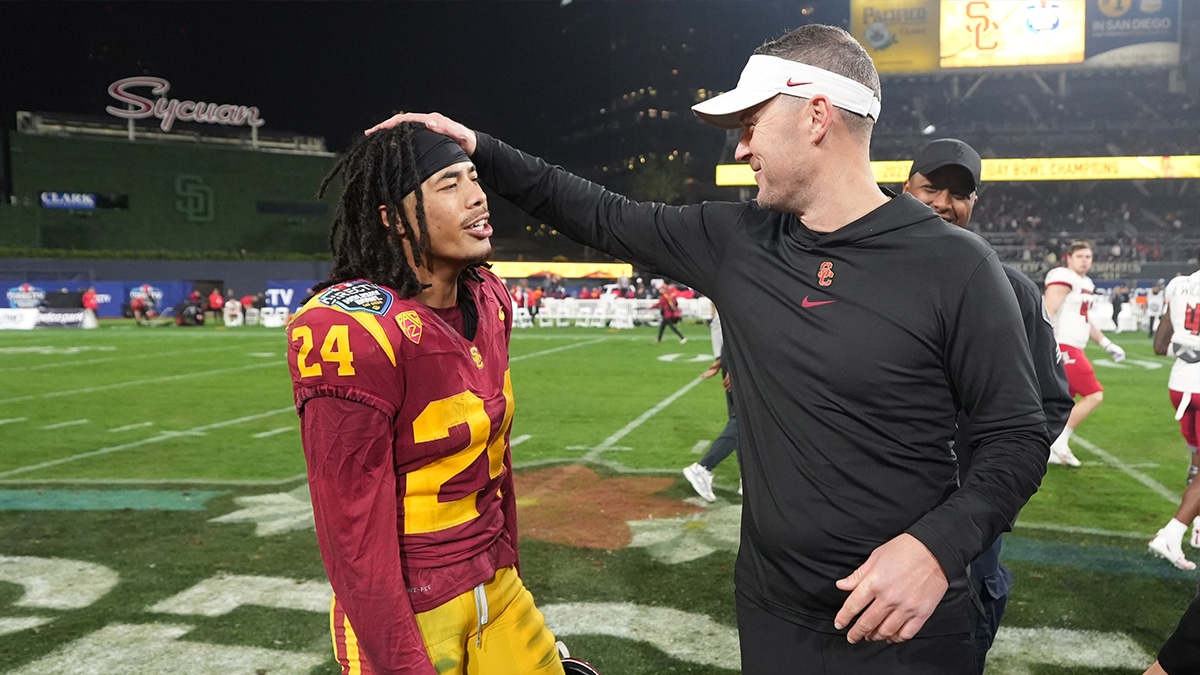 Dec 27, 2023; San Diego, CA, USA; Southern California Trojans head coach Lincoln Riley (right) celebrates with wide receiver Makai Lemon (24) after the Holiday Bowl against the Louisville Cardinals at Petco Park. Mandatory Credit: Kirby Lee-USA TODAY Sports