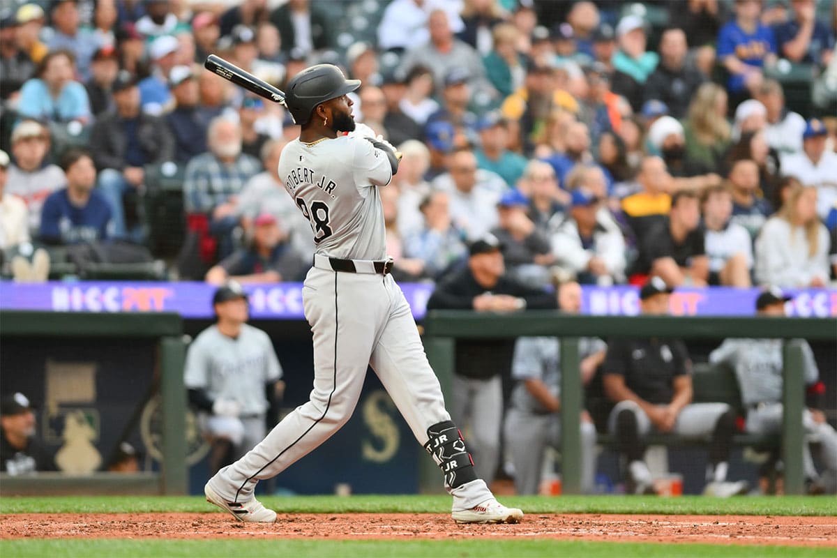 Chicago White Sox center fielder Luis Robert Jr. (88) hits a 2-run home run against the Seattle Mariners during the sixth inning at T-Mobile Park. 