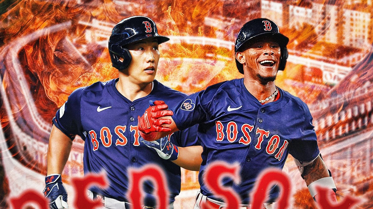 Masataka Yoshida and Ceddanne Rafaela on fire with Yankee Stadium in the background.