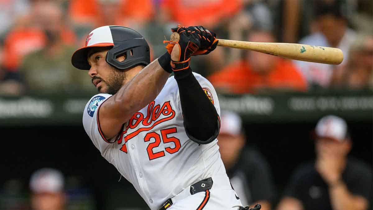 Baltimore Orioles outfielder Anthony Santander (25) hits a single during the fifth inning against the Texas Rangers at Oriole Park at Camden Yards.
