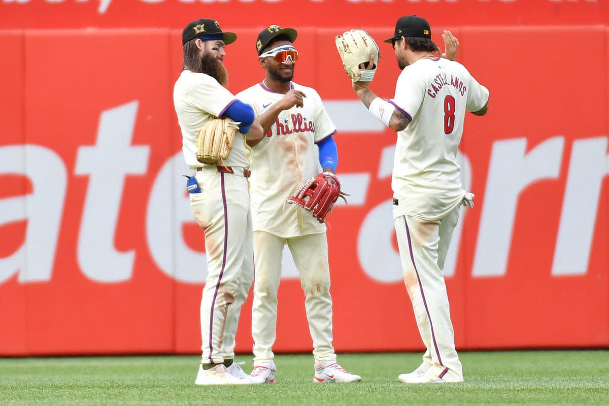 Philadelphia Phillies outfielder Brandon Marsh (16), outfielder Johan Rojas (18) and outfielder Nick Castellanos (8) celebrate win against the Washington Nationals at Citizens Bank Park.