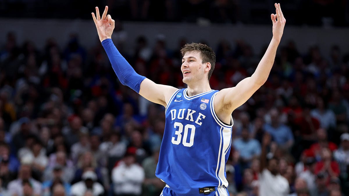 Duke Blue Devils center Kyle Filipowski (30) reacts after a basket during the second half in the semifinals of the South Regional of the 2024 NCAA Tournament against the Houston Cougars at American Airlines Center.