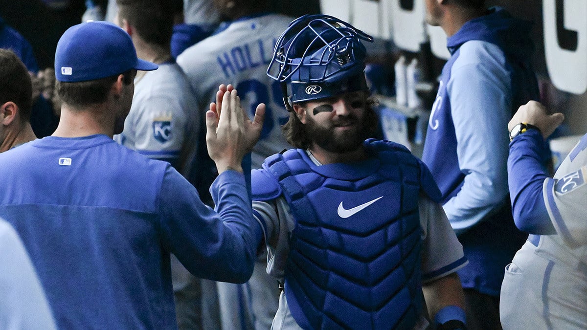 Kansas City Royals catcher Logan Porter (88) greets teammates in the dugout before the game against the Chicago White Sox at Guaranteed Rate Field.