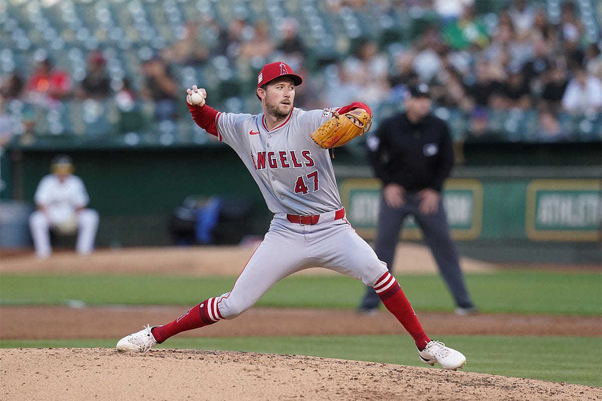 Los Angeles Angels pitcher Griffin Canning (47) delivers a pitch against the Oakland Athletics in the third inning at Oakland-Alameda County Coliseum. 