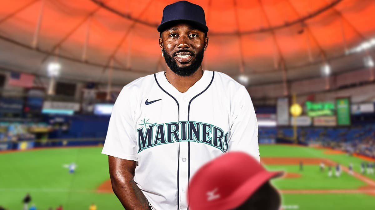 Randy Arozarena in a Mariners jersey with Tropicana Field in the background.
