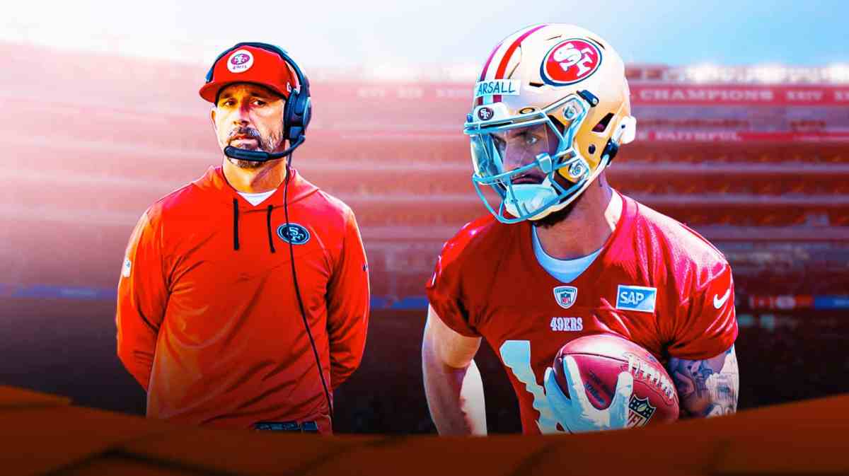 San Francisco 49ers receiver Ricky Pearsall with head coach Kyle Shanahan beside him.