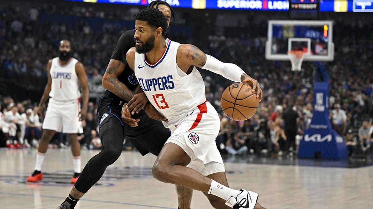 LA Clippers forward Paul George (13) drives to the basket against the Dallas Mavericks during the first quarter during game six of the first round for the 2024 NBA playoffs at American Airlines Center.